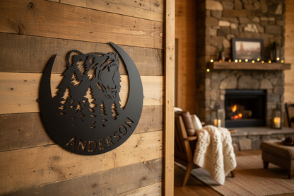 Roaring Bear Monogram Steel Sign hanging on a rustic lodge wall