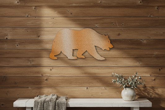 Grizzly Bear steel sign hanging on a rustic farmhouse wall